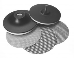 A set of black and gray sharpening pads and wheels used to maintain carbide masonry hand tools