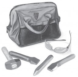 A swept grip tool set consisting of stone hammers points chisels safety glasses and a canvas carrying bag