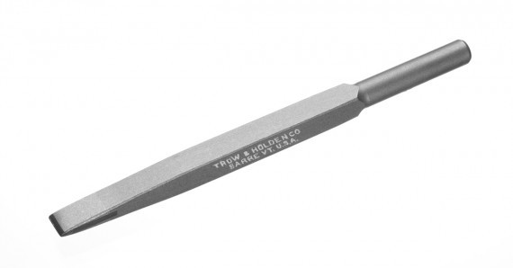 A carbide machine chisel for use with pneumatic devices and suitable for soft or hard stone