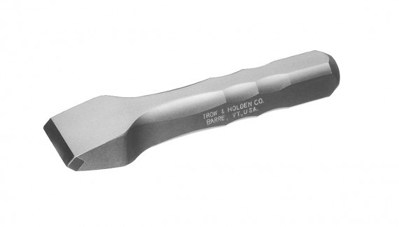 A carbide hand tracer with comfort grip used for splitting stone