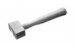 A soft stone hammer used for shaping softer types of stone