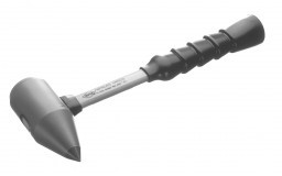 A carbide hammer point used for material removal