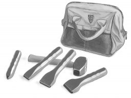 A set of carbide hand tools including hammer and chisels used for stone shaping