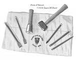 Five carbide tipped chisels and point and two stone hammers used for carving granite marble or limesone