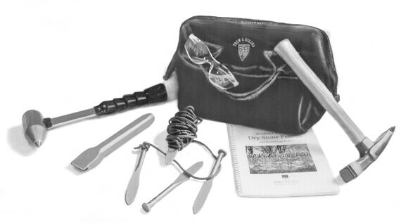 A dry stone walling set consisting of stone hammers chisels points and tool bag