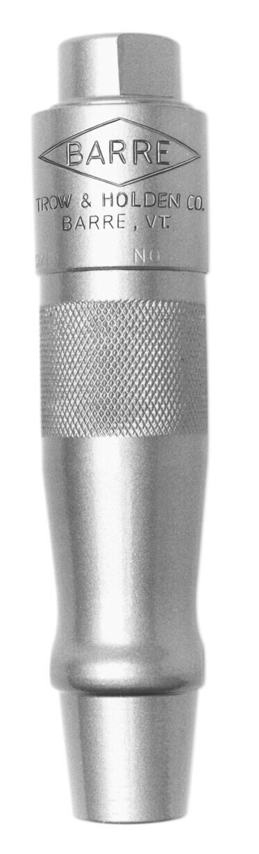 A close up of a type b pneumatic hammer used for sculpting and shaping softer stone