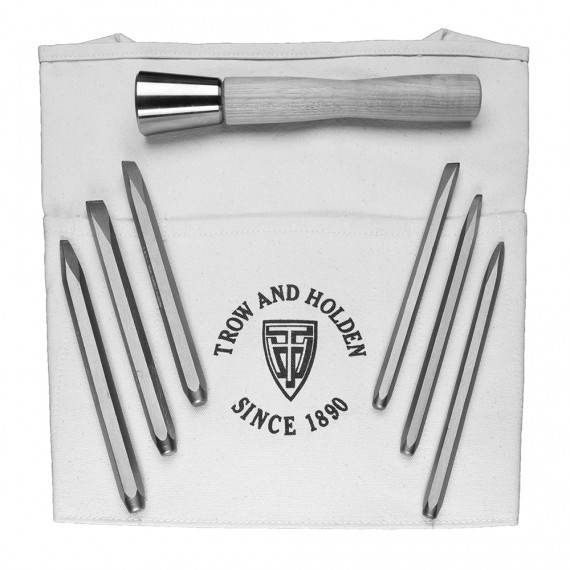 Carbide Hand Carving and Lettering Set A collection of six carbide tipped chisels and a stone hammer for delicate carving laid out on a foldable carrying case