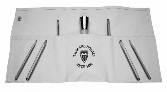 Carbide Hand Carving and Lettering Set Six carbide tipped chisels and a stone hammer some of which are tucked into a carrying case pockets with others arranged on top