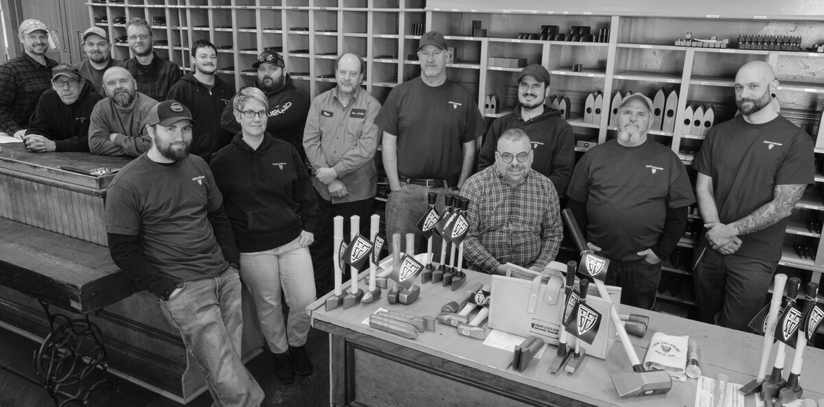 A group photo of our staff in black and white