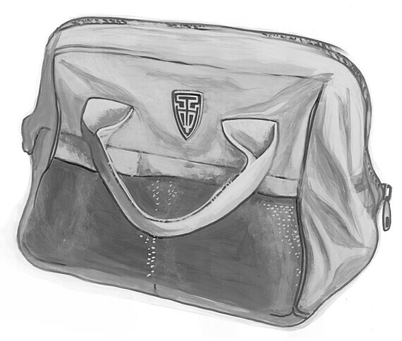 A closed cotton canvas tool bag with handles and the trow and holden logo