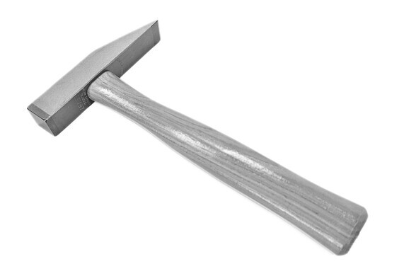 Carbide tipped hammer for trimming thin stone