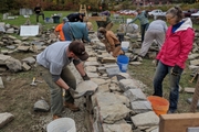 construction of instructional dry stone wall at Vermont Granite Museum