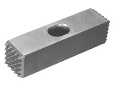 A steel bushing hammer used for stone shaping