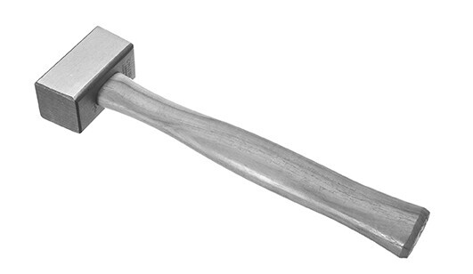 A soft stone hand hammer for shaping softer stone