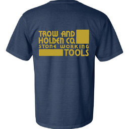 A midnight blue trow and holden branded t shirt with gold writing on it